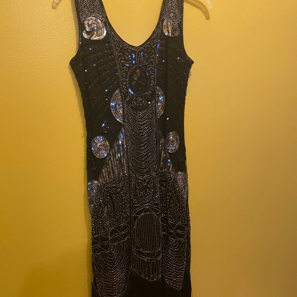 Black and gold sequin dress